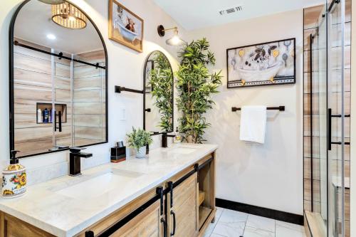 a bathroom with a sink and a mirror at Joshua Tree Pool/Spa Villa in Joshua Tree