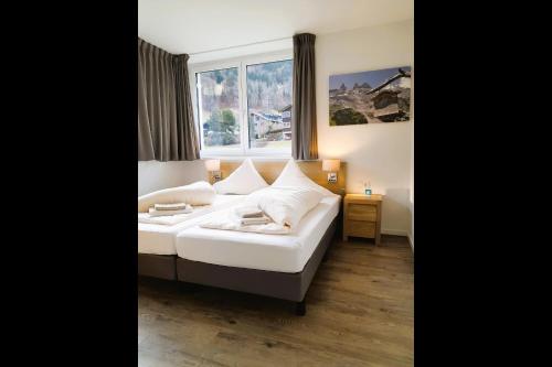 Кровать или кровати в номере Drei Türme Top 5