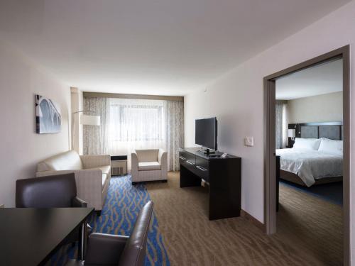 a hotel room with a bed and a television at Holiday Inn Washington Capitol-National Mall by IHG in Washington