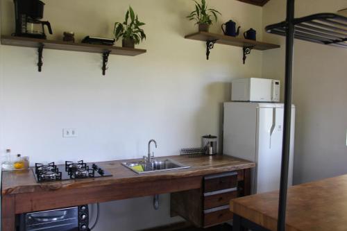 Kjøkken eller kjøkkenkrok på Cabana Rustica