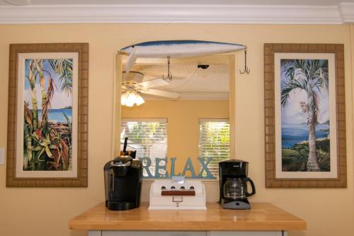 a kitchen with a counter with a coffee maker on a table at Anna Cabana Bungalow #1 in Holmes Beach