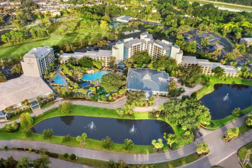 an overhead view of a resort with two ponds at Delta Hotels by Marriott Orlando Celebration in Orlando