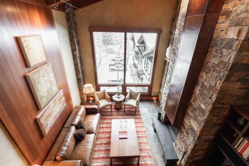 an overhead view of a living room with a couch and a table at Lodge at Vail Condominiums in Vail