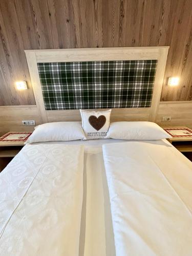Residence Ravisa Dolomitesにあるベッド