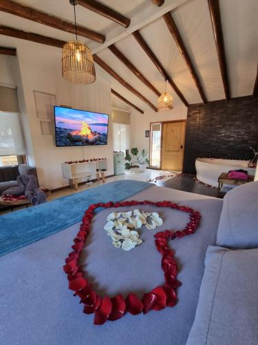 a living room with a heart made out of roses at Reñaca House in Viña del Mar
