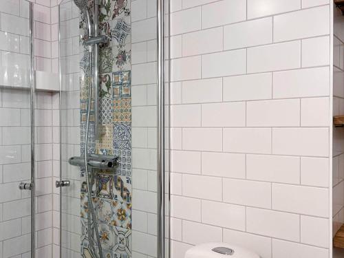 a bathroom with a shower with a toilet at 4 star holiday home in Mellösa-By Traum in Mellösa