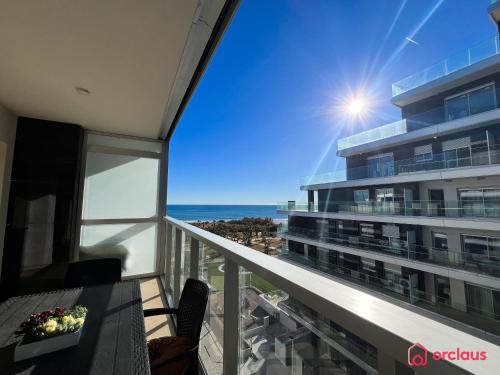 a balcony with a view of a building at Una Mirada al Alba in Cabanes