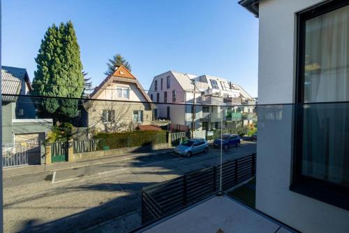 a view of a street from a window of a building at Bennett Apartment in Vienna