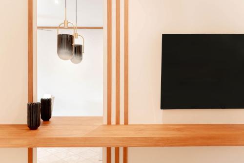 Μια τηλεόραση ή/και κέντρο ψυχαγωγίας στο Stylish Apartment w/ Hotel Amenities @ Los Sueños