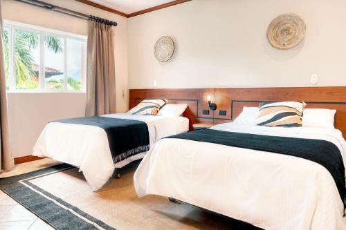 Ένα ή περισσότερα κρεβάτια σε δωμάτιο στο Stylish Apartment w/ Hotel Amenities @ Los Sueños
