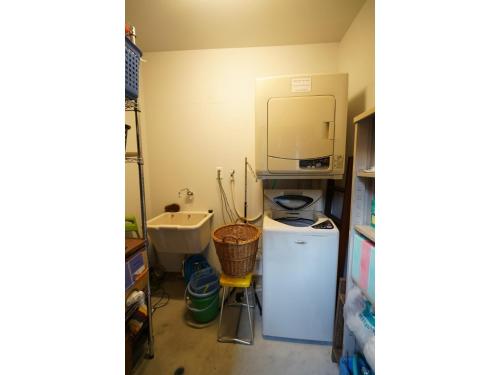 a small kitchen with a sink and a refrigerator at Uji Tea Inn - Vacation STAY 27208v in Uji