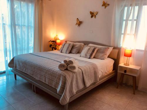 Postel nebo postele na pokoji v ubytování Beautiful Home by the Beach - 3Bedrooms, 2.5Baths