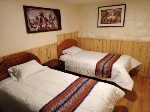 Krevet ili kreveti u jedinici u okviru objekta Paucartambo wasichay hostal
