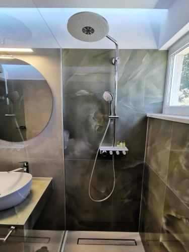 a bathroom with a shower and a sink at Luxury apartment Galant 1 in Split