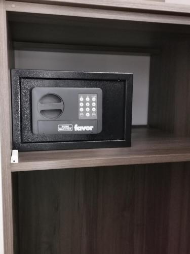 a microwave oven sitting on top of a shelf at Luxury apartment Galant 1 in Split