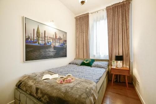 Katil atau katil-katil dalam bilik di BETTER PLACE Classical Warsaw