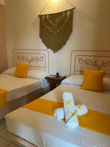 A bed or beds in a room at Hotel El almirante