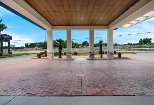 a large pavilion with a brick floor and white columns at Hampton Inn Columbia-I-26 Airport in Columbia