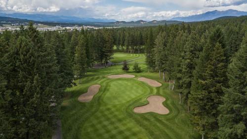 an overhead view of a golf course with trees at Days Inn by Wyndham Cranbrook Conference Centre in Cranbrook