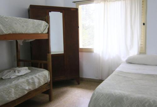 Ліжко або ліжка в номері El Pinar