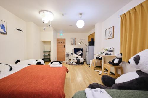 Postel nebo postele na pokoji v ubytování TORA HOTEL Tokyo Ueno 寅ホテル 上野 A