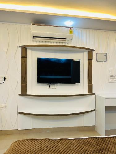 TV a/nebo společenská místnost v ubytování The Dreamlight Studio
