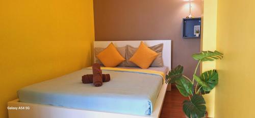 Ένα ή περισσότερα κρεβάτια σε δωμάτιο στο Peony's Home