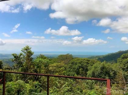 a view of a forest from a balcony with a view at BaliApartments in Grand-Baie