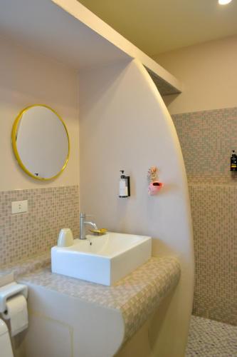Ein Badezimmer in der Unterkunft Le Divine Comedie Beach Resort