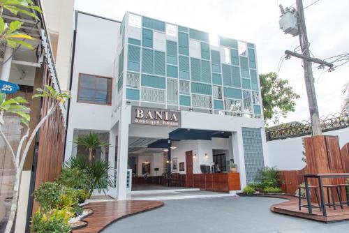 a building with a sign that reads bankka dental clinic at Bania Boutique House in Khao Lak