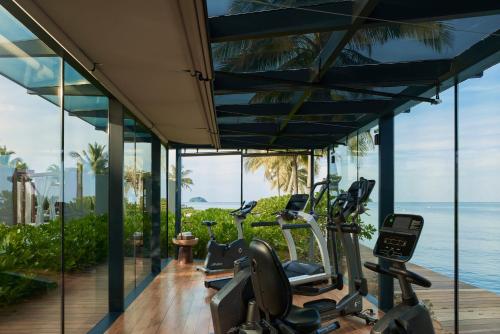 a gym with a view of the ocean at The Retreat Koh Chang, an SLH Hotel in Ko Chang