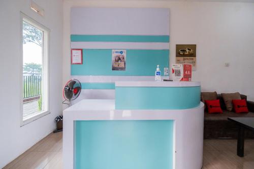 Fotografie z fotogalerie ubytování RedDoorz at Omahku Guest House Batu v destinaci Malang