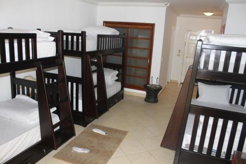 Voodi või voodid majutusasutuse Herrmes Hostel أجانب فقط toas
