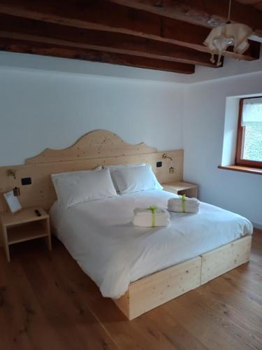 Postel nebo postele na pokoji v ubytování La Farie