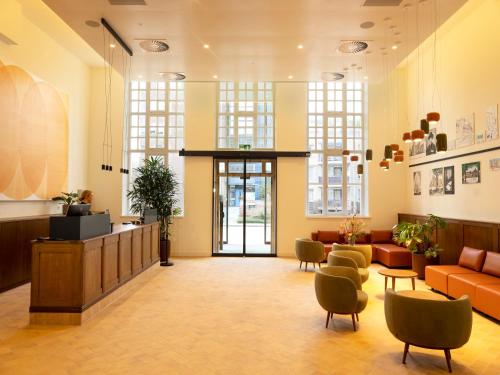 a lobby of a hospital with a waiting room at DoubleTree by Hilton Sittard in Sittard