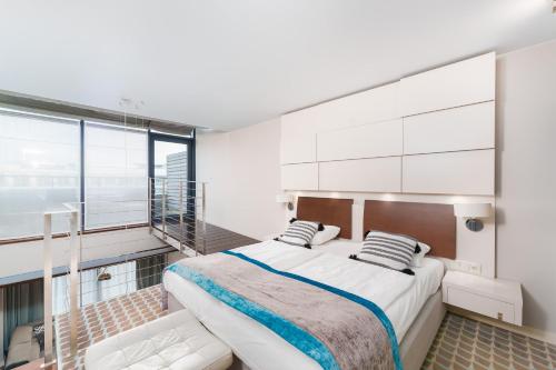 Posteľ alebo postele v izbe v ubytovaní Apartamenty Almar Marine