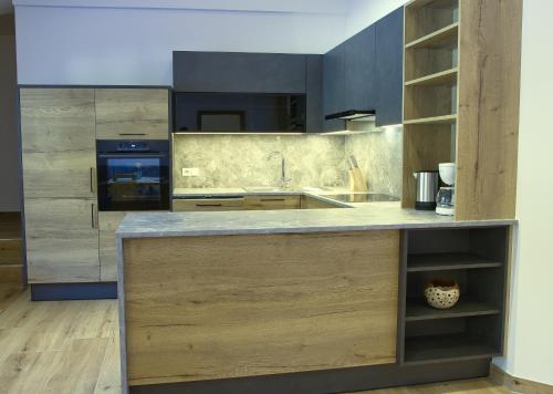 a kitchen with a sink and a counter top at Tonibauer in Tamsweg