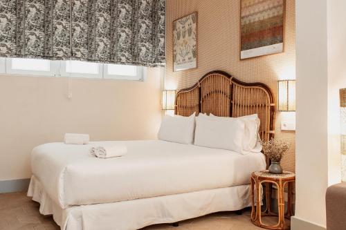 Llit o llits en una habitació de BYPILLOW Residence Abril