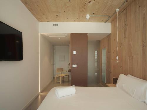 Hotel Amiukaにあるベッド