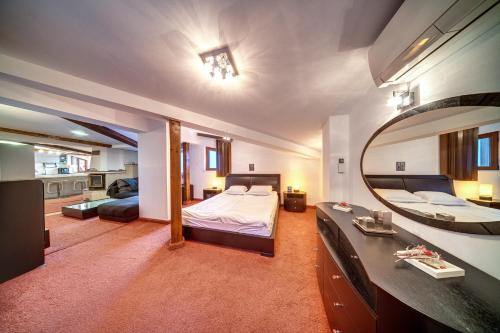 A bed or beds in a room at The Castle Complex