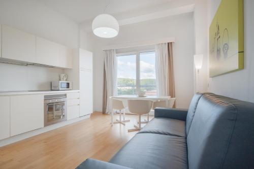 Kuchyň nebo kuchyňský kout v ubytování Felix Hotels - Residence Hotel Grandi Magazzini
