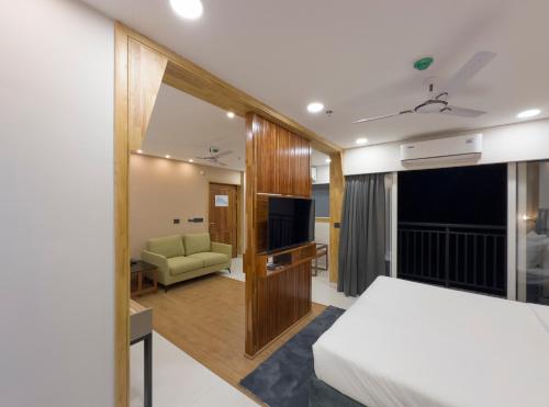 Postel nebo postele na pokoji v ubytování The Habitat Suites