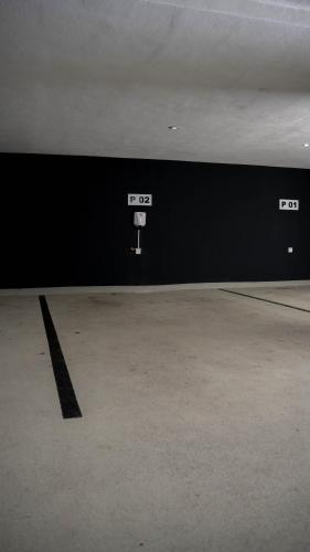 an empty room with a basketball hoop on the wall at Sonnige Gartenwohnung in Fritzens