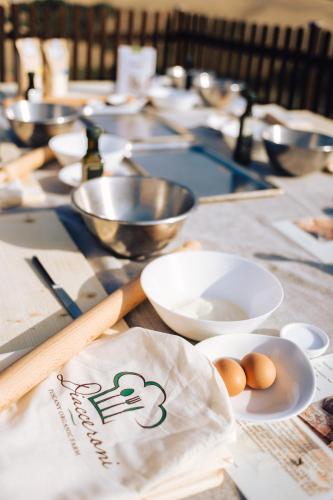 a long table with bowls and eggs on it at Agriturismo Panieracci in Villamagna