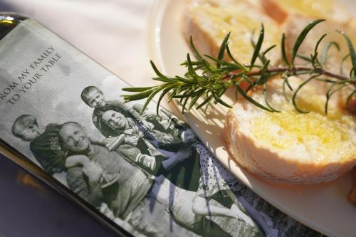a plate of food with a sandwich and a magazine at Agriturismo Panieracci in Villamagna
