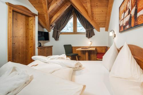 Hotel Garni am Sonnbergにあるベッド