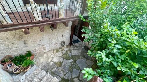 an overhead view of a building with plants and a balcony at Juliet Suite by TrulyCyprus in Doros