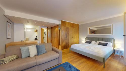Postel nebo postele na pokoji v ubytování Abitaziun Residence 10A - St Moritz