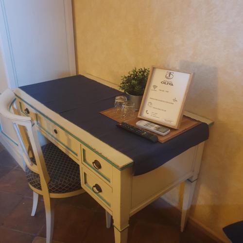 a desk with a box on top of it at Tenuta Oliva in Fisciano