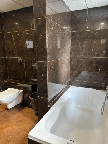 Koupelna v ubytování Hotel secure inn kadodara road